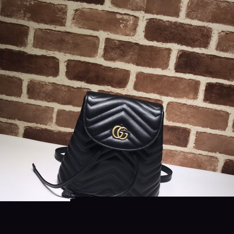 G*u*i backpacks
